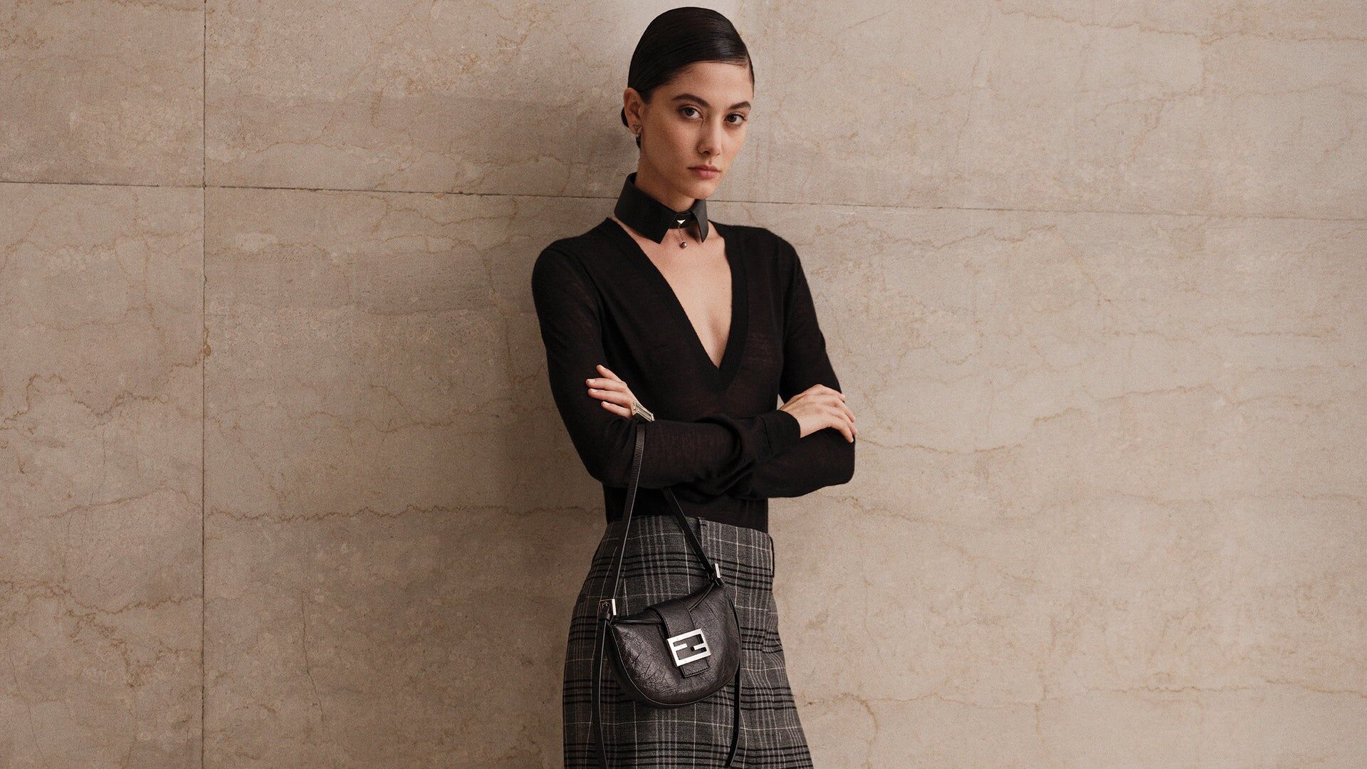 Fendi Croissant Cruise 2027 — model with a half-moon bag