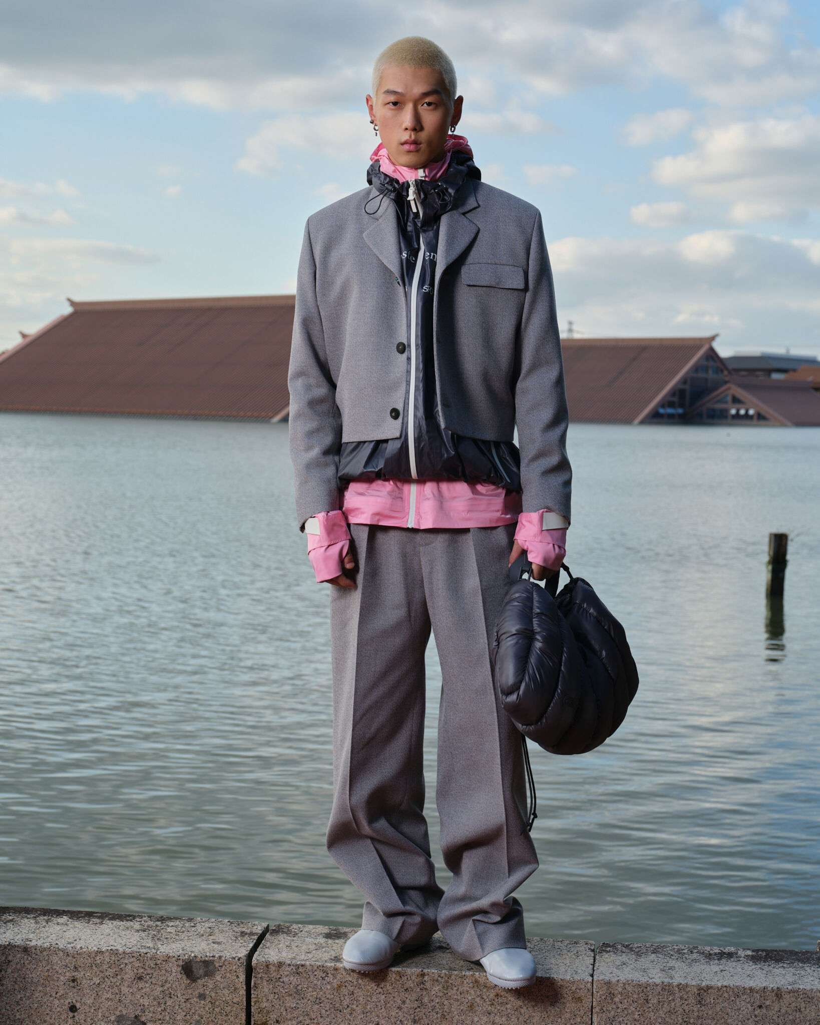 Grey and pink look from the Lacoste × Wang Yibo capsule