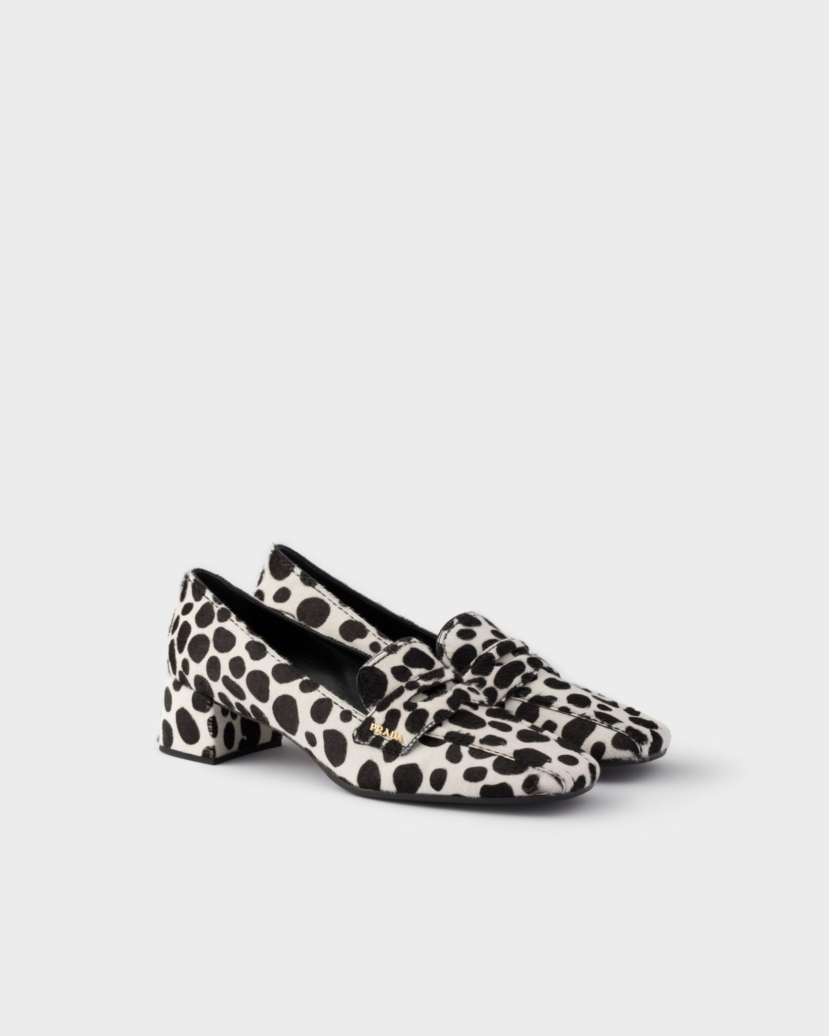 Prada dalmatian-print calf hair leather loafers
